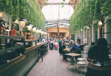 people sitting inside restaurant tables