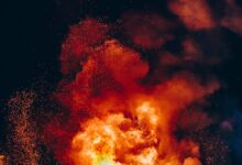 fire with black smoke during night