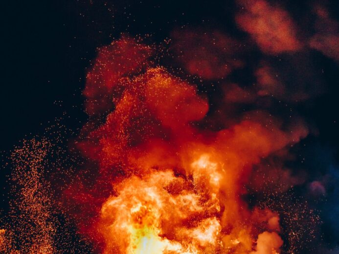 fire with black smoke during night