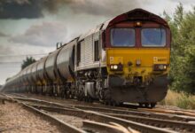 yellow and black train on railways