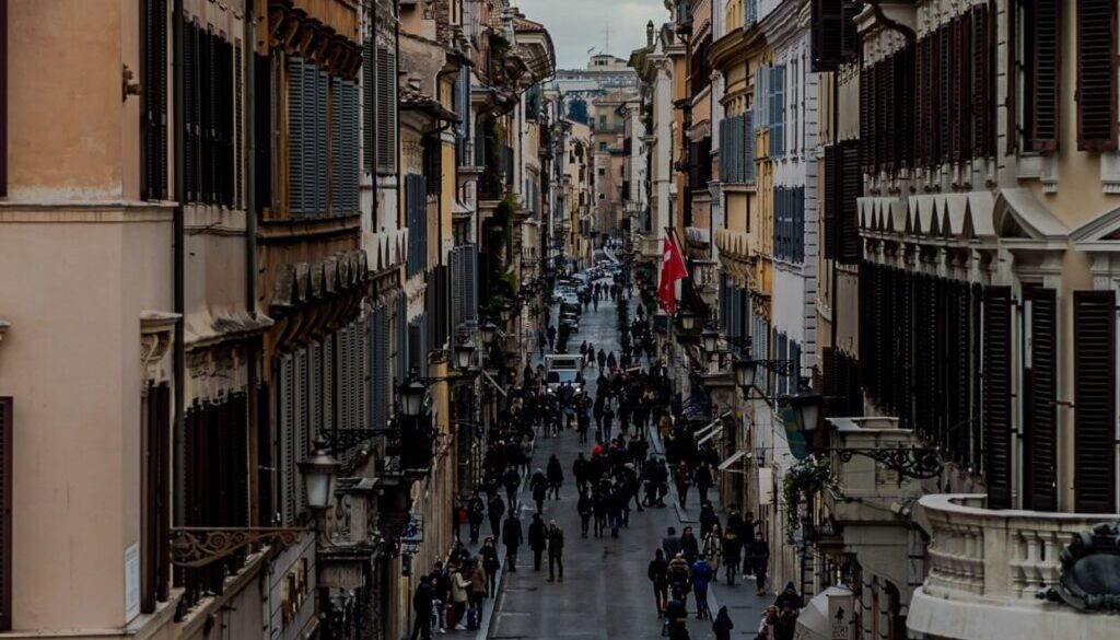 Alex Blăjan / Unsplash.com people in between two buildings at daytime