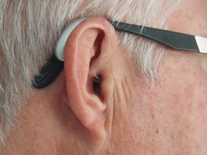 person wearing white and black sunglasses