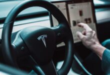 black Tesla steering wheel