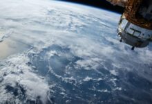 view of Earth and satellite