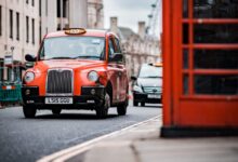 red and black mini cooper on road during daytime