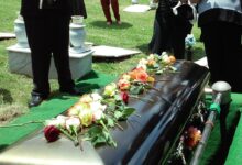 group of people attending burial