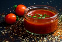 tomato and tomato puree with parsley in bowl
