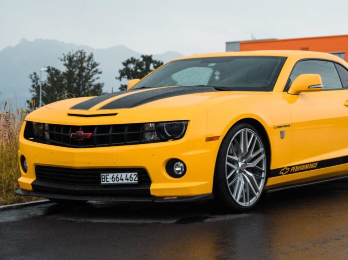 yellow Chevrolet coupe close-up photography
