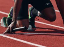 man on running field