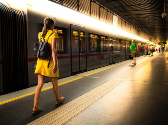 people walking at train station