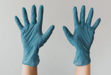 persons left hand with white background