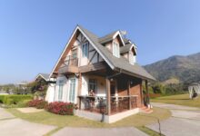 white, gray, and brown house under blue sky
