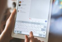 person using white iPad