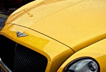 yellow Bentley car