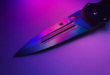 black and gray folding knife