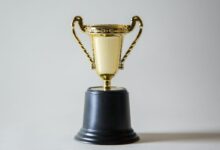 yellow and white trophy
