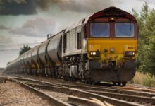yellow and black train on railways