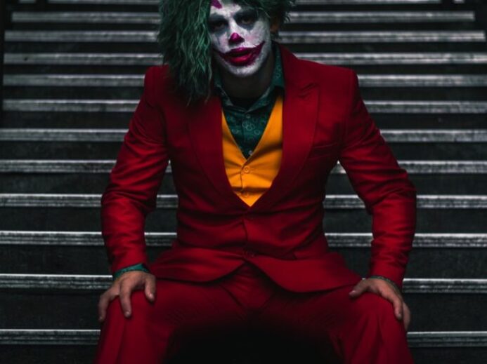 Joker sitting on stairs