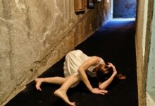 woman lying on hallway