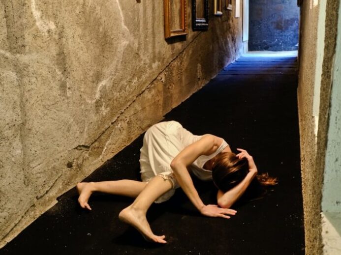 woman lying on hallway