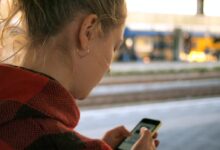 woman holding phone
