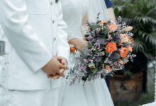 woman holding bridal bouquet