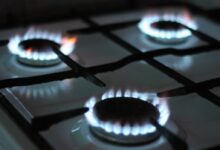 black gas stove with white and black gas stove