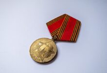 gold and red round pendant