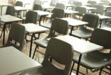 white table with black chairs