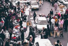 people gathering on road during daytime
