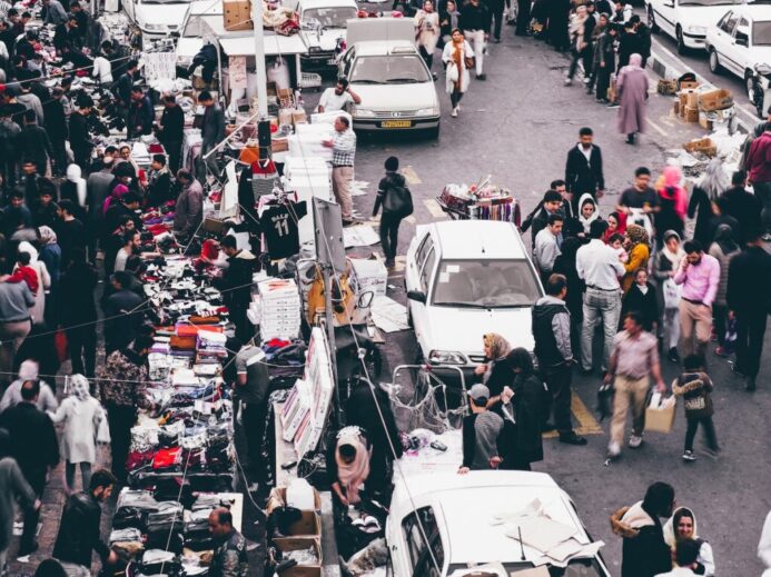 people gathering on road during daytime