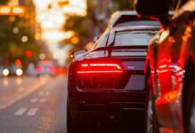 black Audi R8 parked beside road