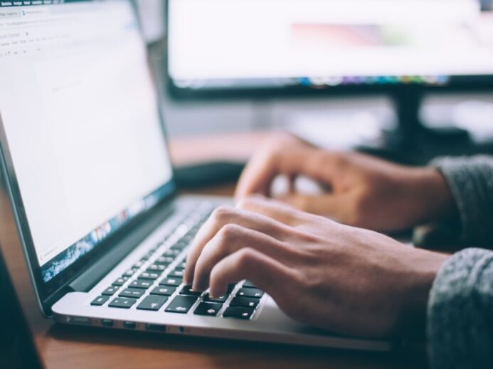 person using MacBook Pro
