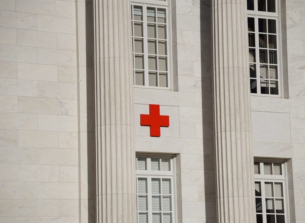 red cross on white concrete building