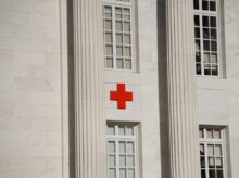 red cross on white concrete building