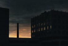 silhouette of building during night time
