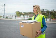 A Woman Carrying a Box