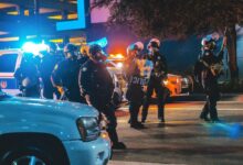 group of police in the middle of the road