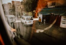 white van on road during daytime