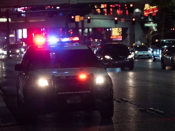 black car on road during night time