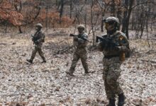 three soldiers at the forest