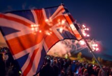 people holding flags during night time