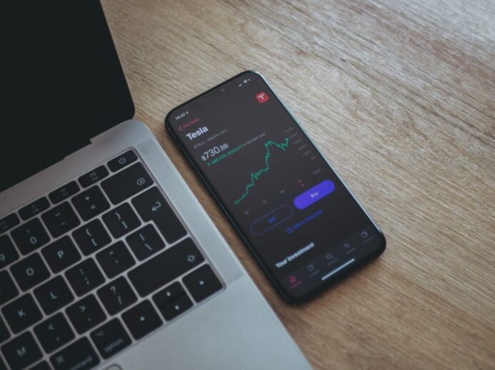 black android smartphone on macbook pro
