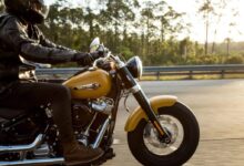 man riding motorcycle photography
