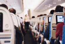 shallow focus photography of people inside of passenger plane