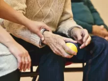 Person Holding a Stress Ball