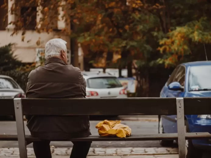 man sitting on bench