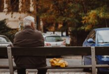 man sitting on bench