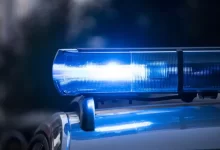 a close up of a police car with its lights on