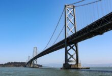 a large bridge spanning over a large body of water